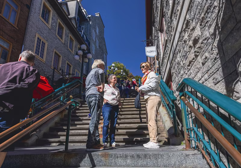 A group on the Breakneck Stairs between the Upper and Lower Town.
